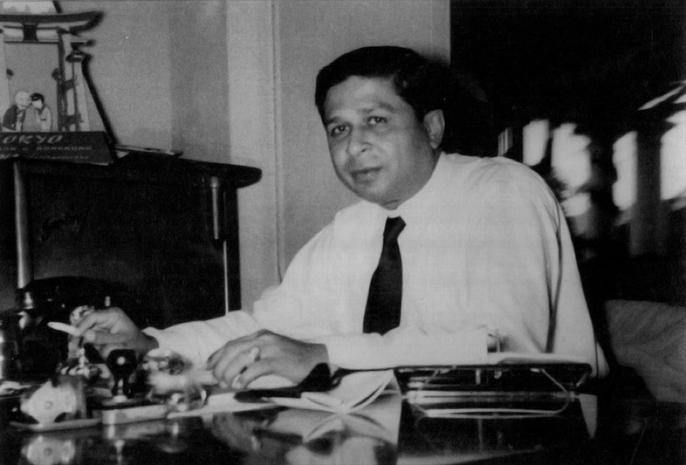 An early photograph from the company archive, taken at the founder's desk
