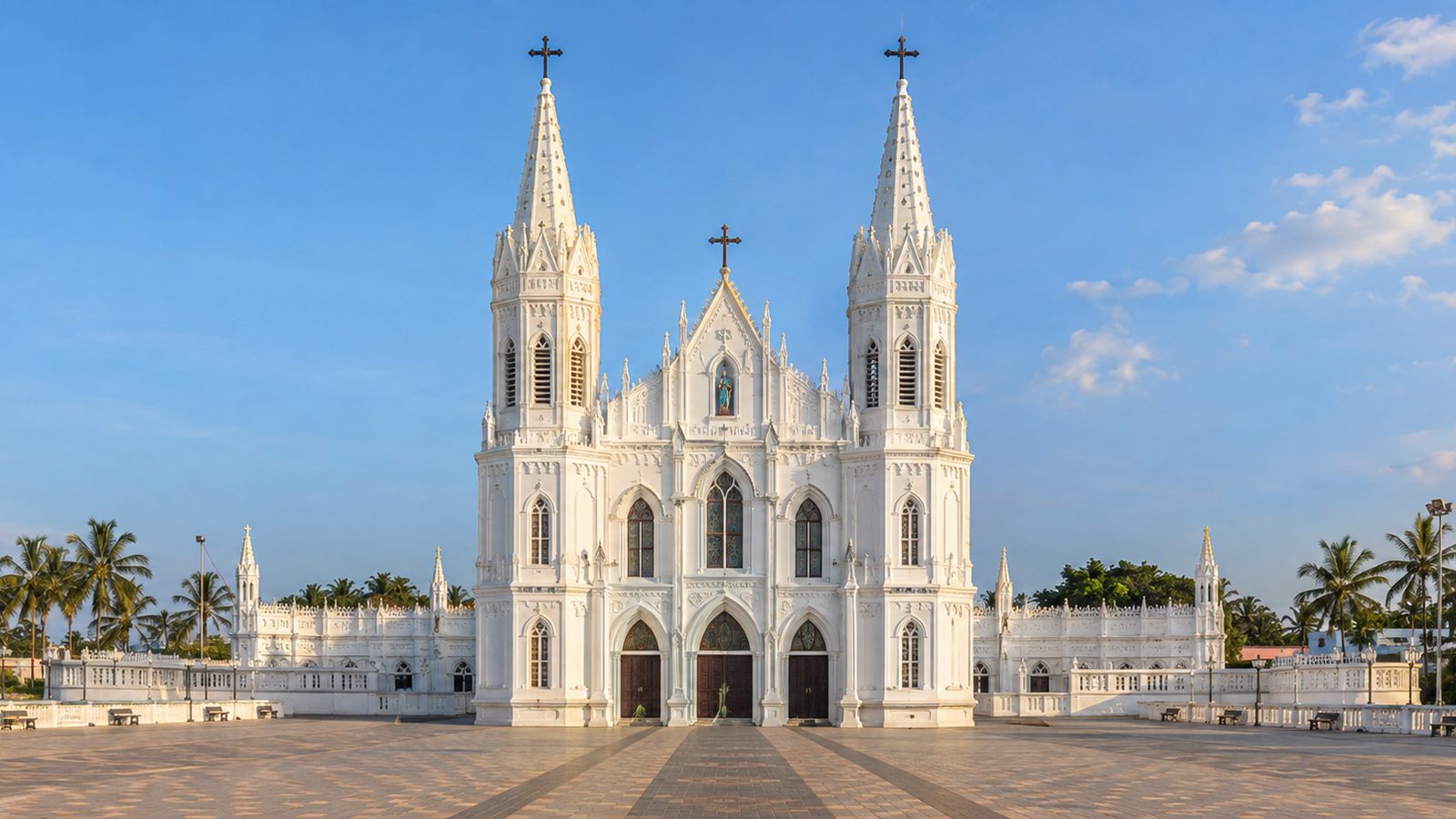 The white basilica at Velankanni against a blue sky